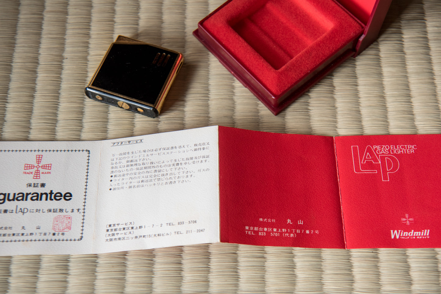 Vintage Black & Gold Japanese Piezo Electric Gas Lighter from Italy, with Maruzen Oil logo, in box