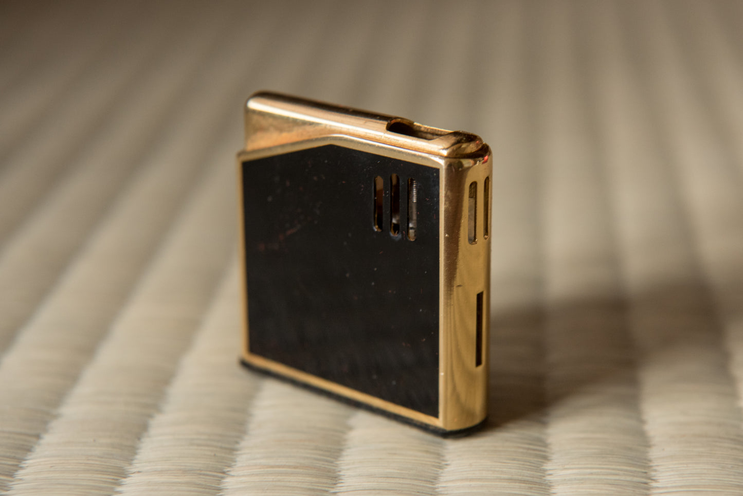 Vintage Black & Gold Japanese Piezo Electric Gas Lighter from Italy, with Maruzen Oil logo, in box